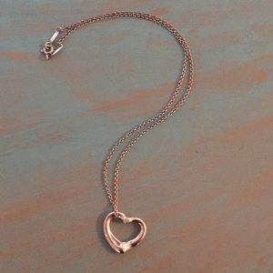 Tiffany’s silver heart necklace with diamond!